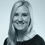 Black and white photo of Nicole smiling